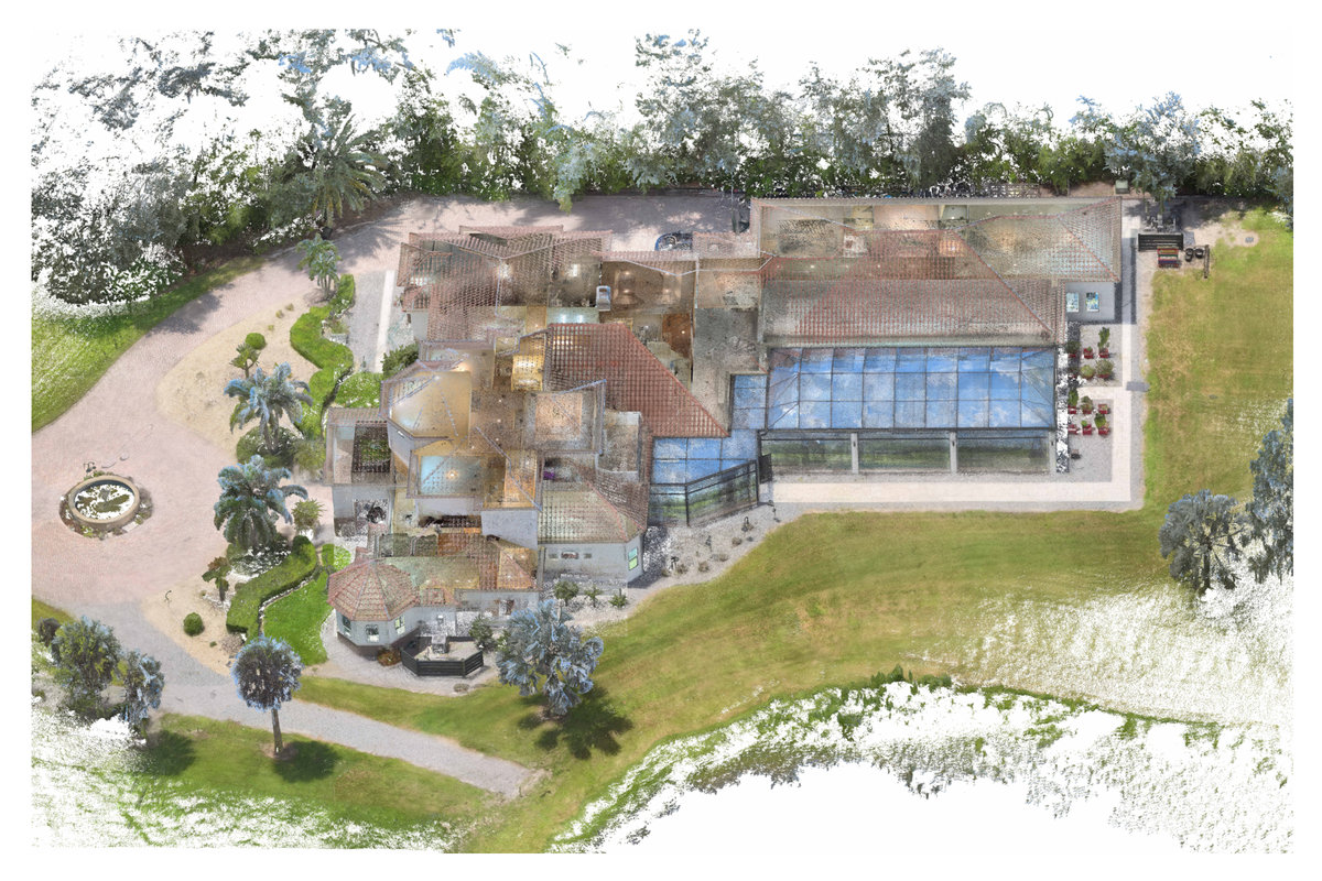 “Overhead point-cloud view of a building and surrounding site conditions.